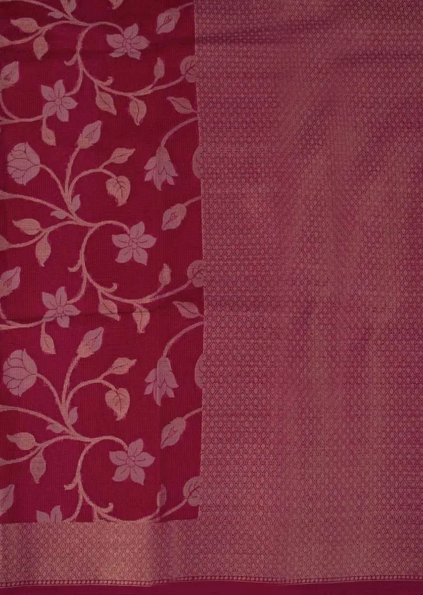 Coral red tussar silk saree with weaved work in floral motif only on Kalki