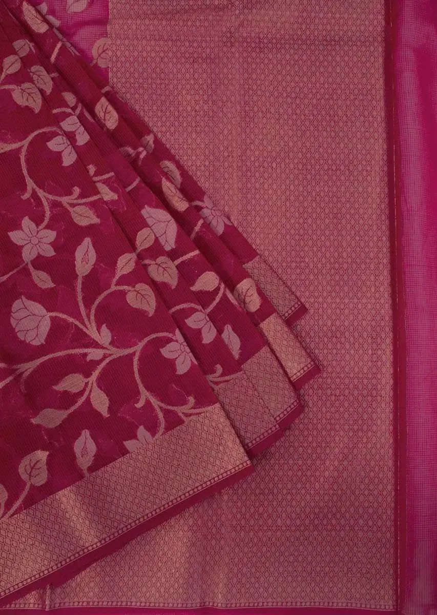 Coral red tussar silk saree with weaved work in floral motif only on Kalki