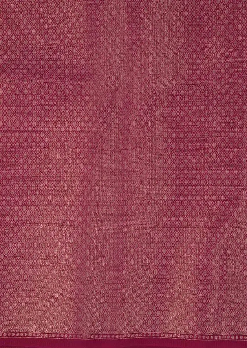 Coral red tussar silk saree with weaved work in floral motif only on Kalki
